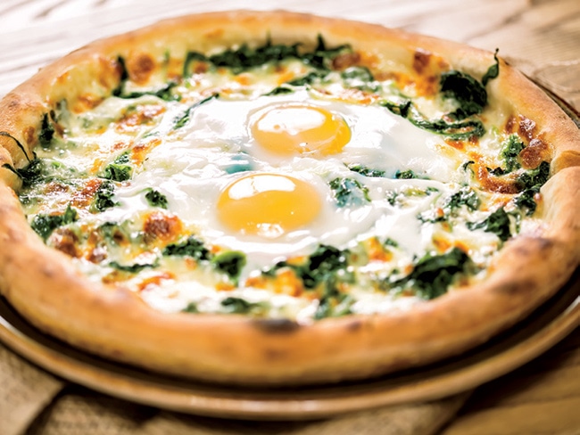 Spinach & egg breakfast pizza.