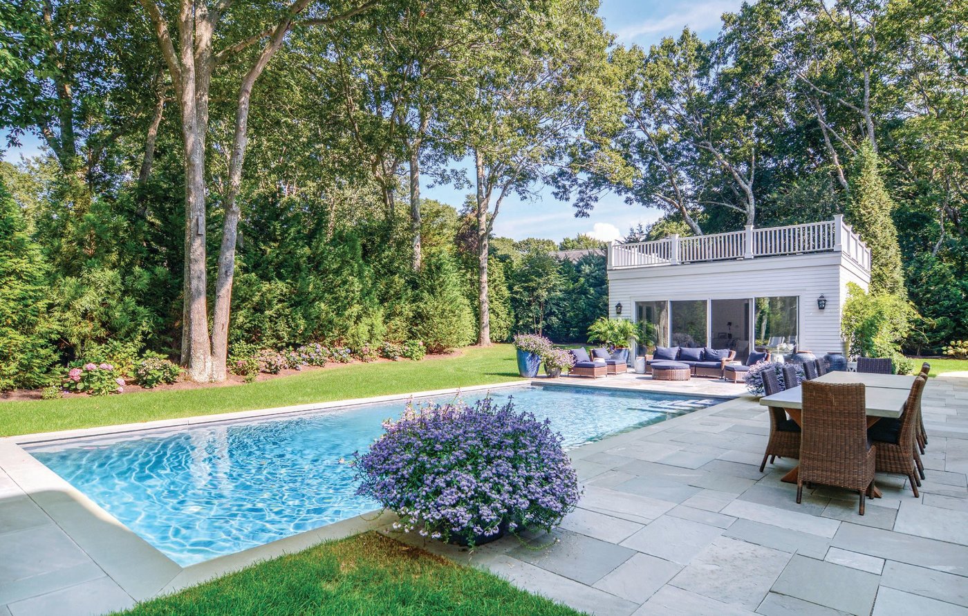 The 20-by-40-foot pool is surrounded by double-layer bluestone paving PHOTO COURTESY OF SAUNDERS & ASSOCIATES