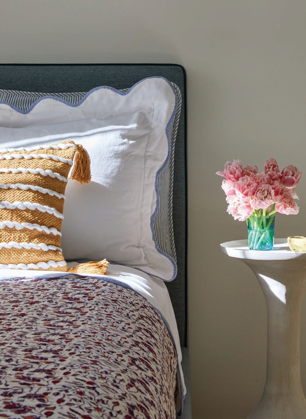 The guest bedroom is cozy with Ballard Designs bedding and a Crate & Barrel bed  PHOTOGRAPHED BY KIRSTEN FRANCIS