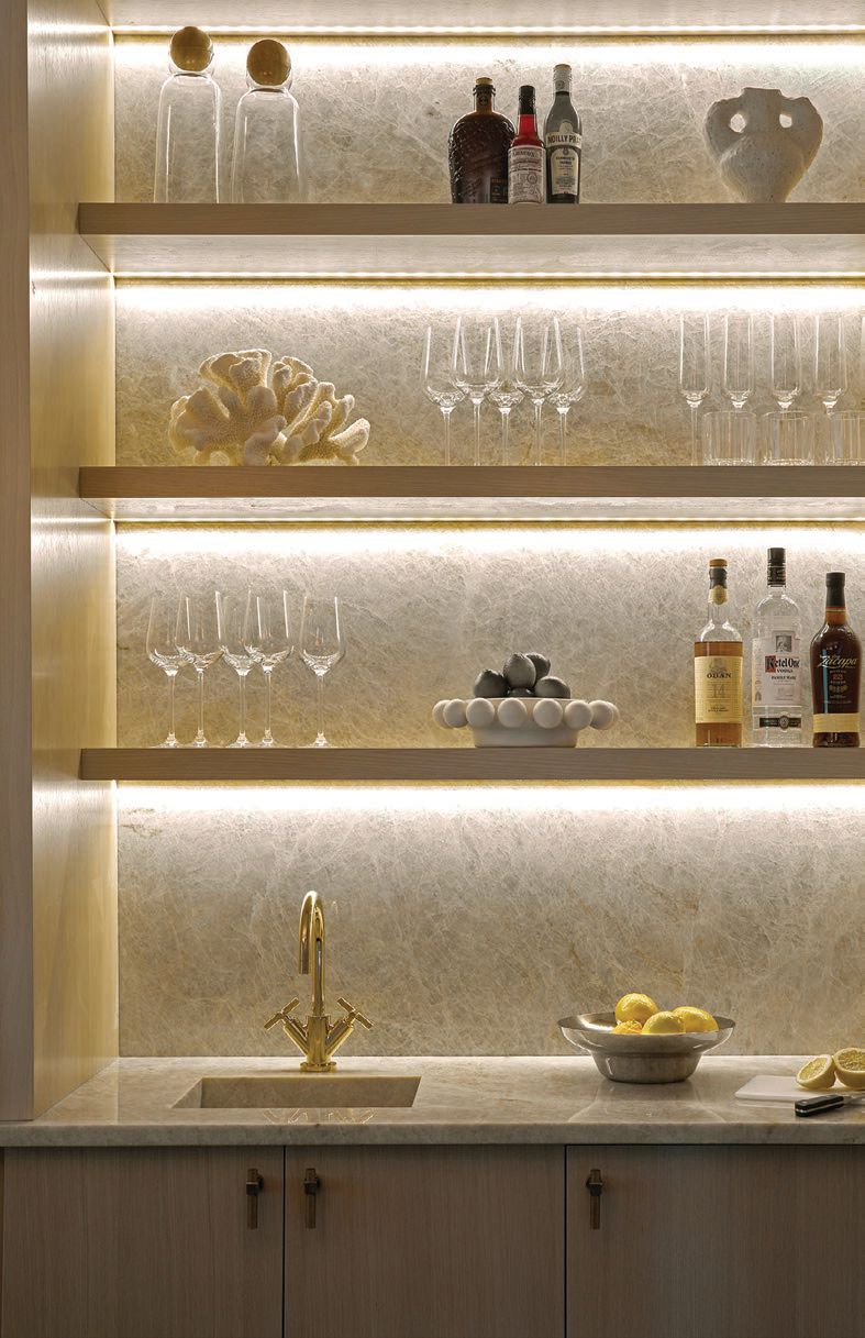 The home’s fully stocked backlit bar PHOTOGRAPHED BY MARCO RICCA