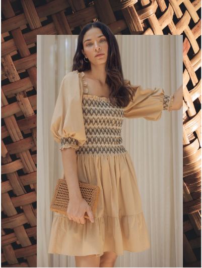 Shop styles like this Celina dress at the Shoshanna x Joey Wölffer pop-up. DRESS PHOTO COURTESY OF BRAND; BACKGROUND PHOTO BY CLAY LECONEY/UNSPLASH