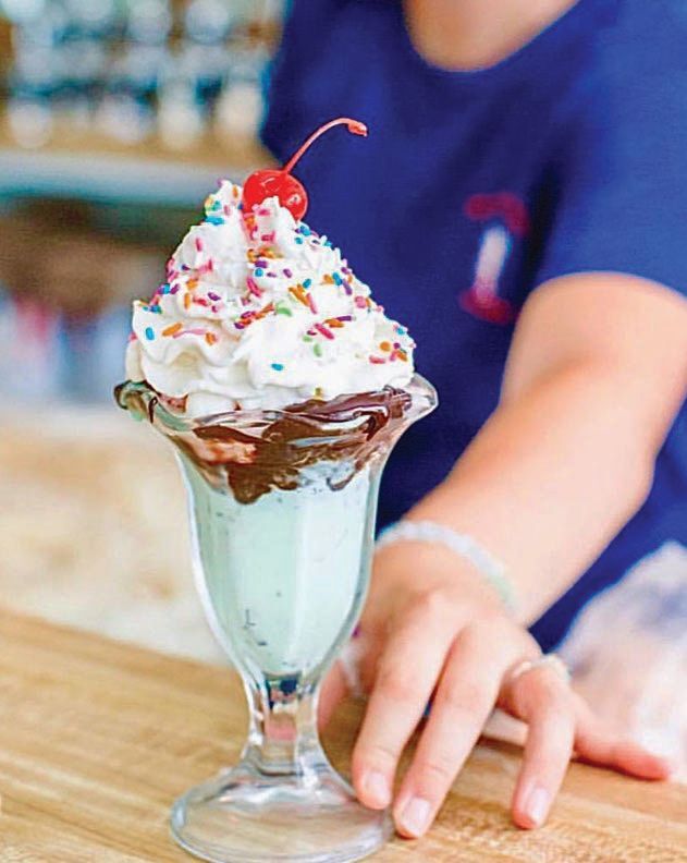 From milkshakes and malts to large cones and ice cream sodas, the menu boasts a flavorful assortment of homemade treats PHOTO COURTESY OF MARK PARASH/SIP’ SODA