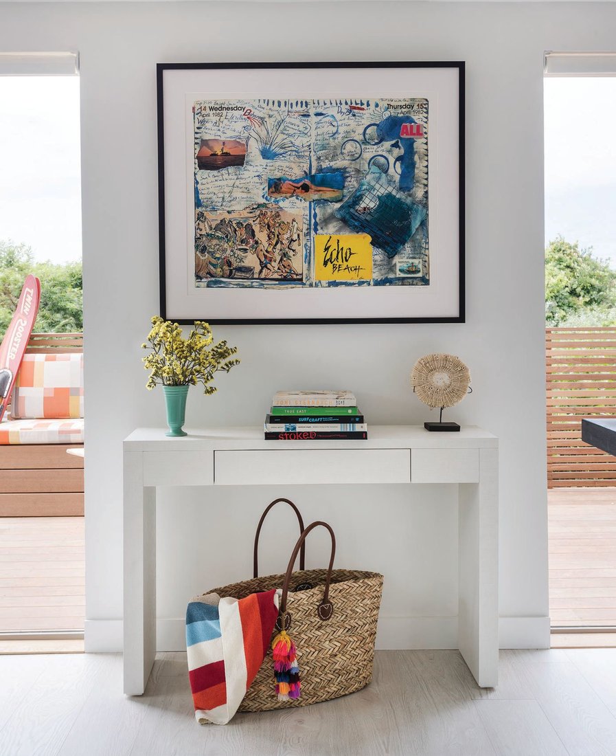 Art throughout the home comes from Tony Caramanico, LeRoy Grannis, Jeff Divine and Clark Little. Pictured here is “The Surf Journals: Crazy on Rum, April 14-15, 1982” by Tony Caramanico. PHOTOGRAPHED BY MATTHEW WILLIAMS