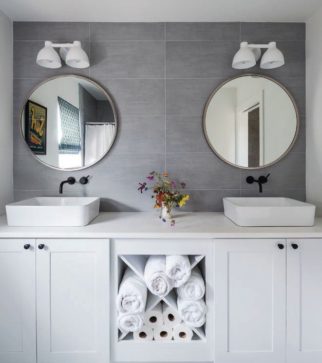 A neutral palette and somewhat minimalist look were used to make the space feel spacious and uncluttered, as in this bathroom PHOTOGRAPHED BY MATTHEW WILLIAMS