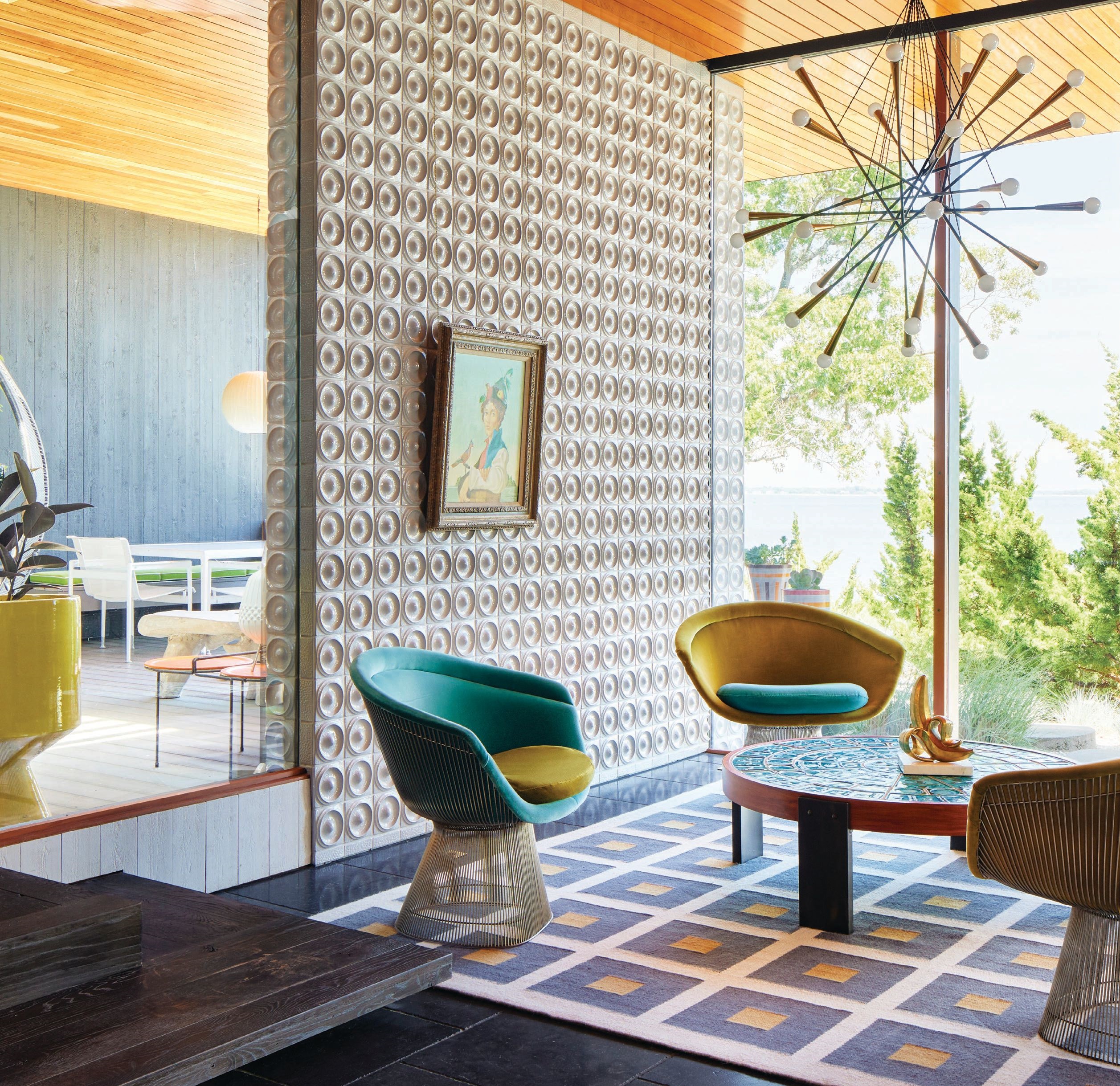 Tiles custom designed by Adler and art by Jean-Pierre Clement offer a counterpoint to vintage Platner chairs in a velvet by Kravet over a Jonathan Adler Peter reversible Peruvian flat-weave rug. PHOTOGRAPHED BY GIEVES ANDERSON