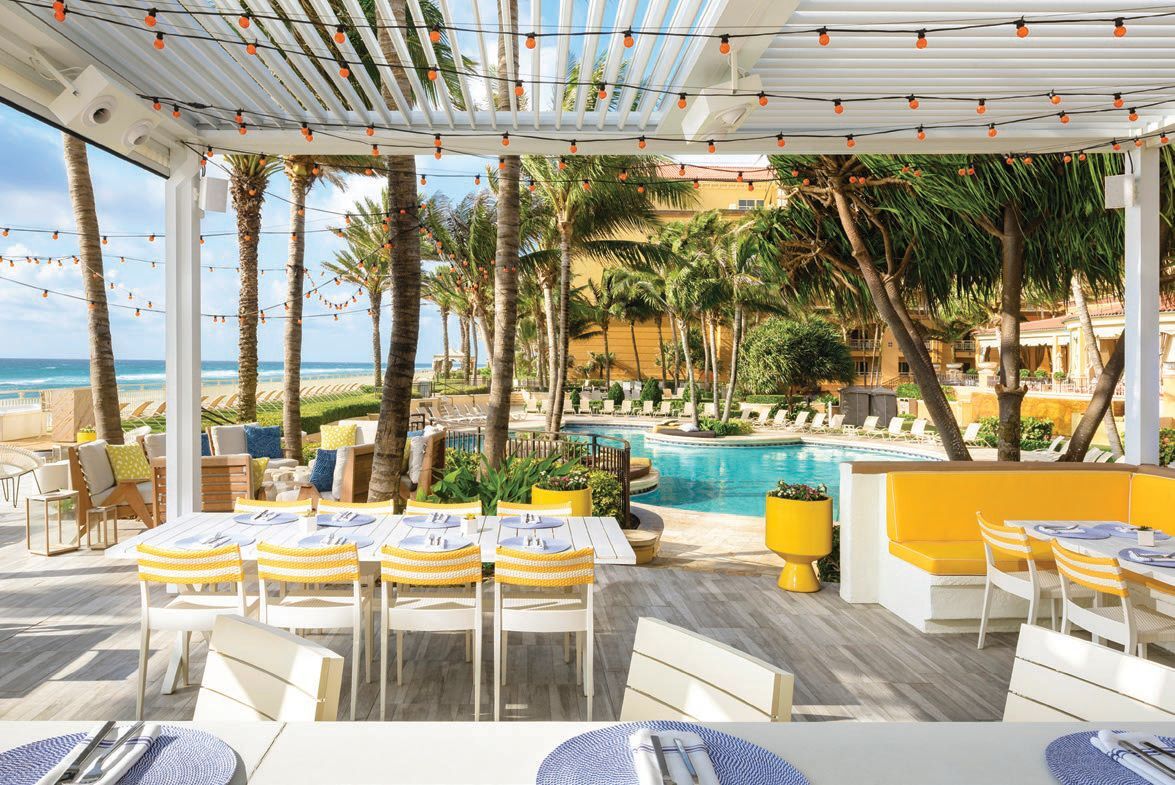 Dine poolside at Eau Palm Beach Resort & Spa. PHOTO COURTESY OF DISCOVER THE PALM BEACHES AND THE BRANDS